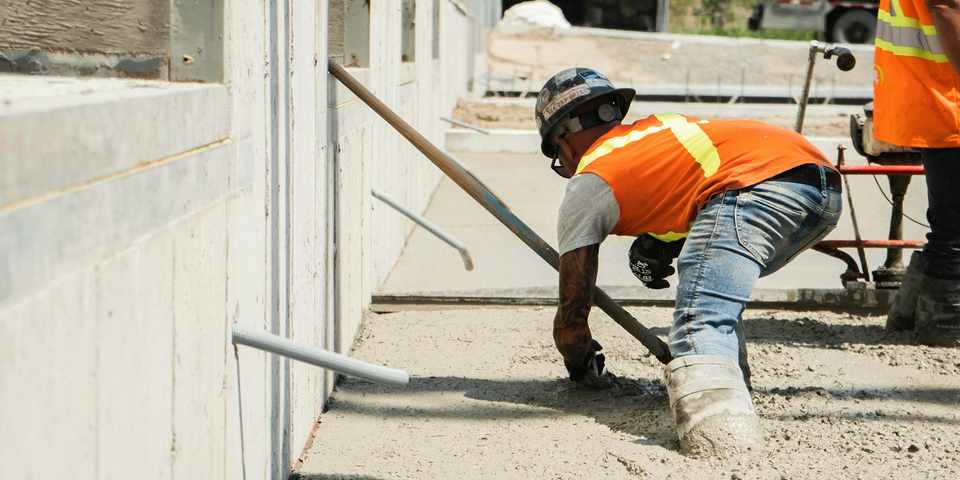 Two-person crew working on a home's exterior